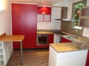Philippe Nourisson, Menuisier- - agencement-et-decoration-d-interieur - catalogue-espace-cuisine - Cuisine rouge et granit